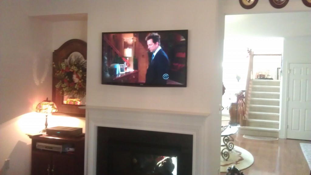 TV installation over a fireplace